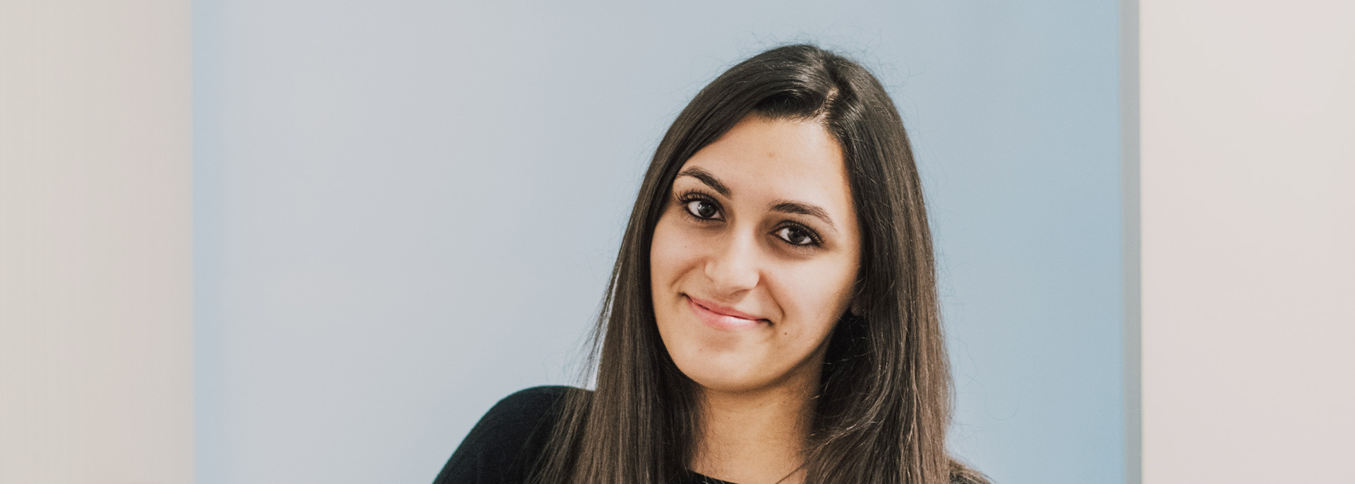 woman smiling at the the camera