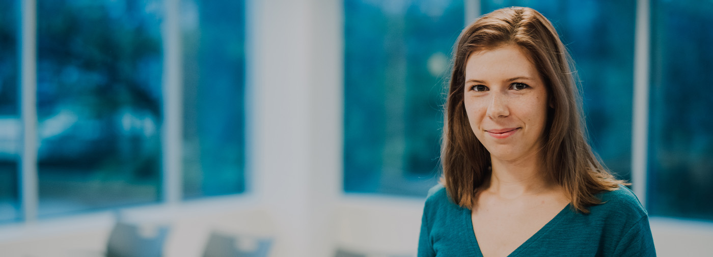 woman looking a the camera smiling